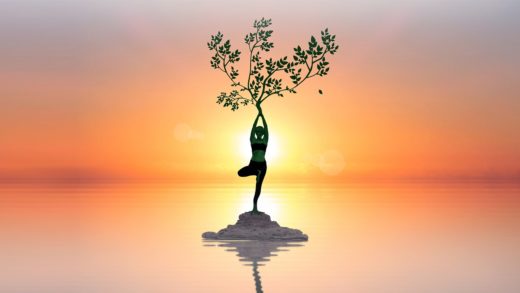 Artsy photo illustation of a woman standing in tree pose while doing yoga.