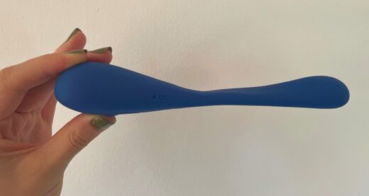 A side view shows the narrow curves of The Double Entendre bendable vibrator from Frenchie.