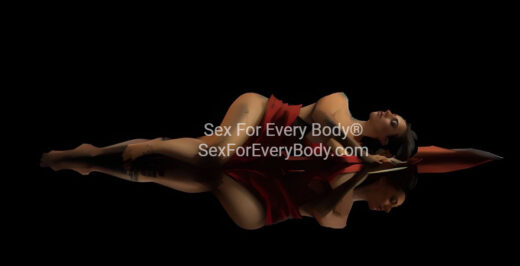 Boudoir photography shoot with a red sheet